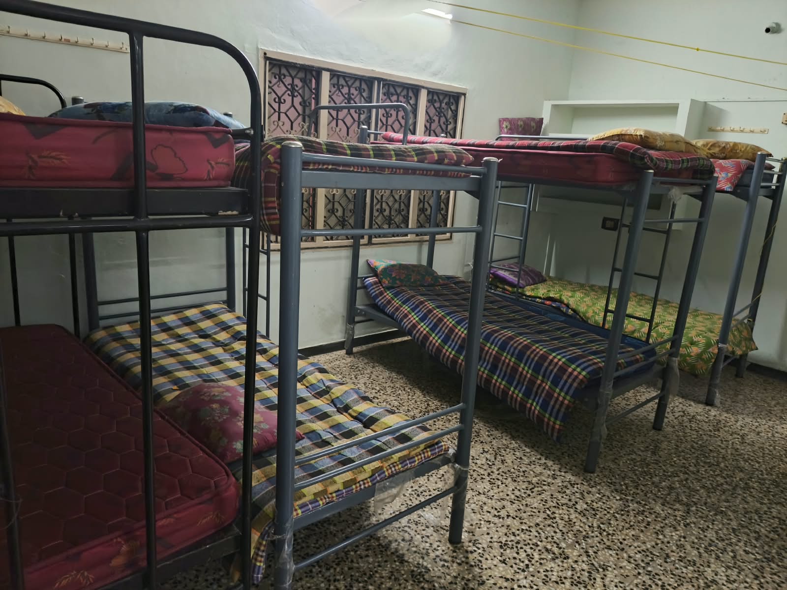 Bunk beds in a shared room at Shree Sai Vishnu PG for Men in Tambaram
